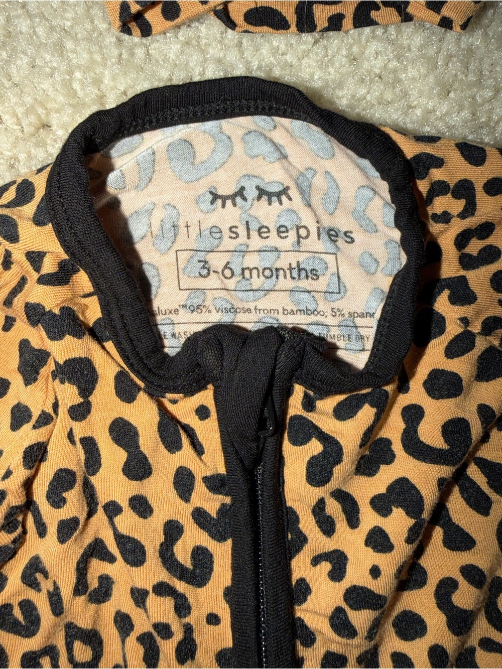 Little Sleepies Leopard Print Footed One-Piece with Black Trim and Matching Bow - Picture 2 of 4